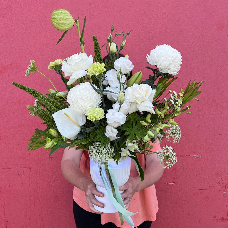 Seasonal white and green flowers for sympathy flower delivery across melbourne