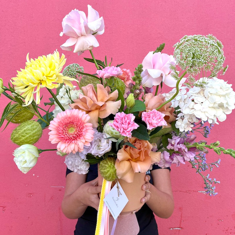 seasonal pastel flowers in a vase