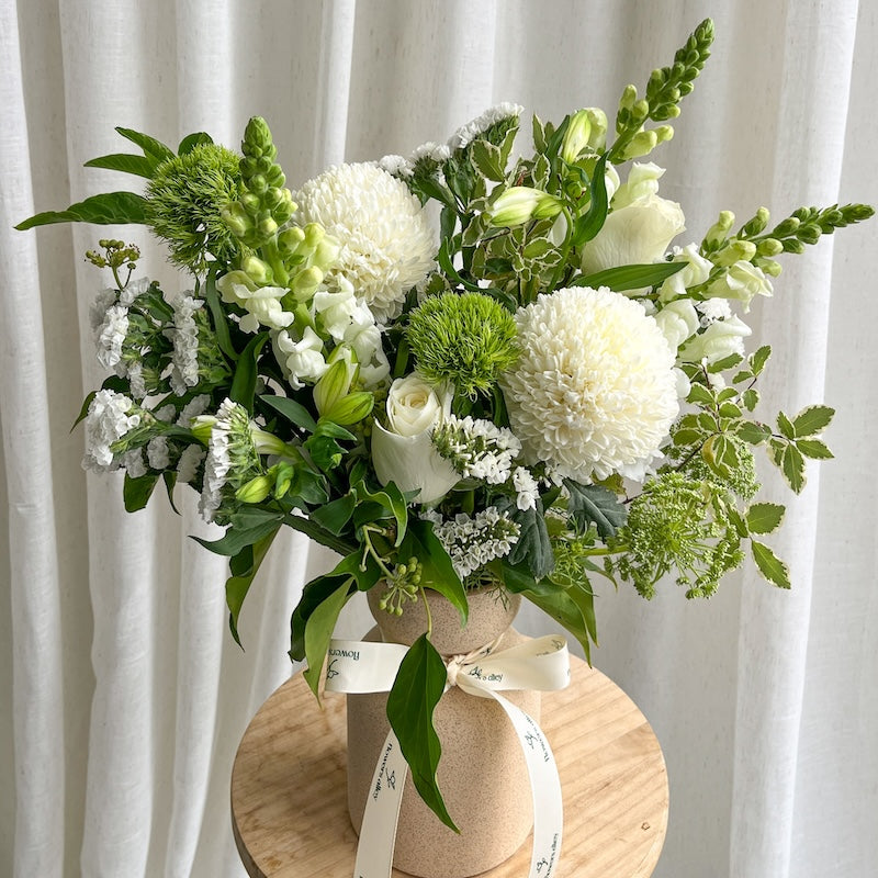 classic white and green flowers vase arrangement