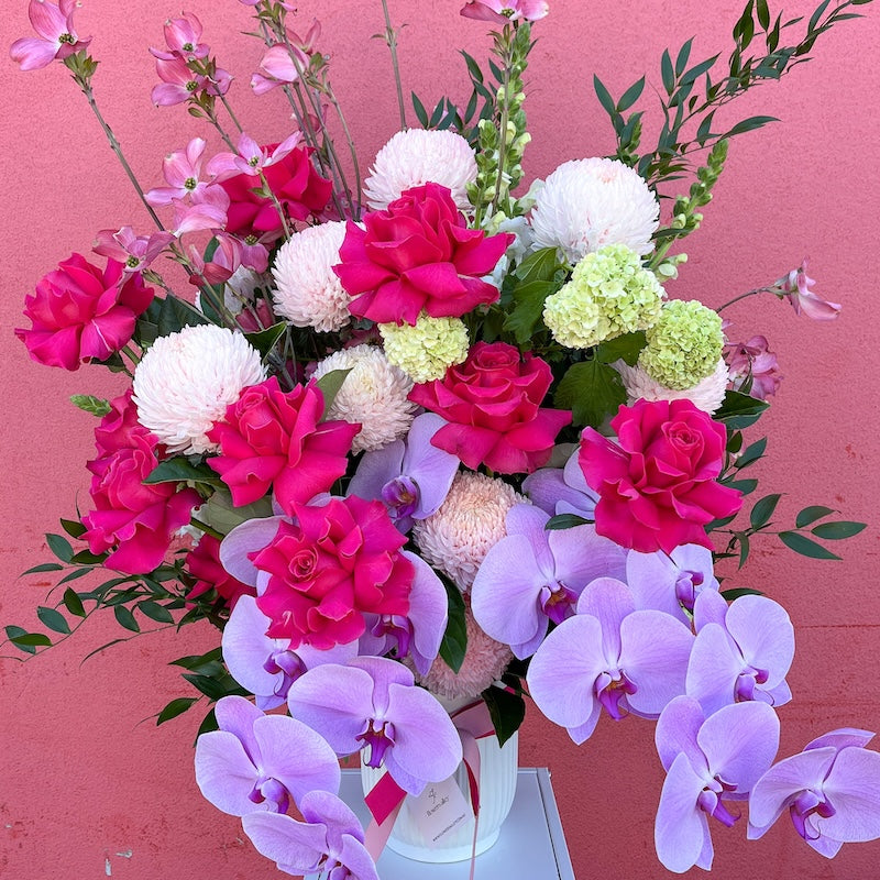 large size vase arrangement in pink flowers 