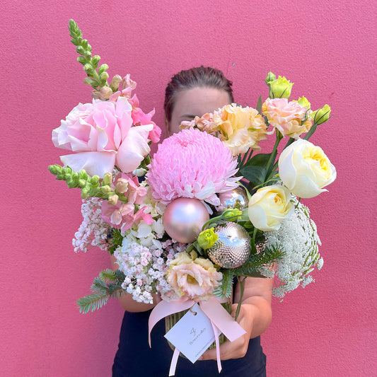 Send mixed pastel Christmas flowers across Melbourne