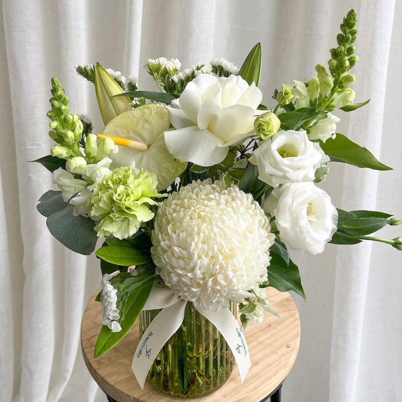 classic white flowers arrangement delivery for sympathy