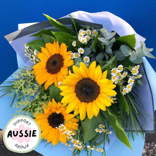 Australia grown sunflowers and seasonal flowers in a bouquet