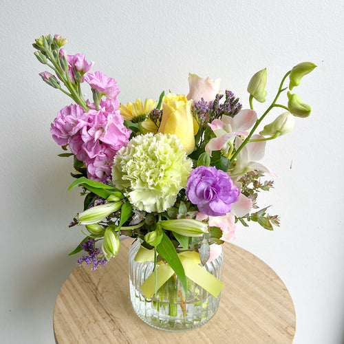 colourful flower arrangement in a glass vase