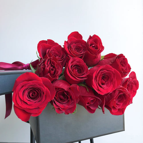 red roses in a elegant gift box